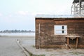 An abandoned wooden old house, desolation and ruin, an old village house by the sea Royalty Free Stock Photo