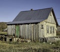 Abandoned wooden old rural house. Deserted country village, desolation and ruin Royalty Free Stock Photo