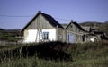 Abandoned wooden old rural house. Deserted country village, desolation and ruin Royalty Free Stock Photo