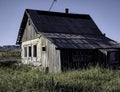 Abandoned wooden old rural house. Deserted country village, desolation and ruin Royalty Free Stock Photo