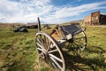 Abandoned wooden wagon and buildings in Old West ghost town Bodie, California Royalty Free Stock Photo