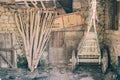 An abandoned wooden wheelbarrow inside an old barn (Asturias) Royalty Free Stock Photo