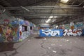 Abandonned industrial place with graffitis Royalty Free Stock Photo