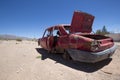 Abandonned red old Peugeot car on ruta 40, Argentina