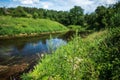 Abava river, grass and clouds Royalty Free Stock Photo