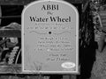 Abbi the Water Wheel sign in Tintern, black and white