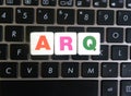 Abbreviation ARQ on keyboard background Royalty Free Stock Photo