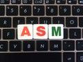 Abbreviation ASM on keyboard background Royalty Free Stock Photo