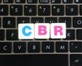 Abbreviation CBR on keyboard background