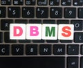Abbreviation DBMS on keyboard background
