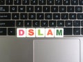 Abbreviation DSLAM on keyboard background