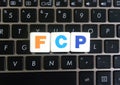 Abbreviation FCP on keyboard background