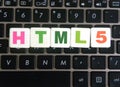 Abbreviation HTML5 on keyboard background Royalty Free Stock Photo