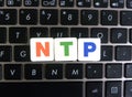 Abbreviation NTP on keyboard background Royalty Free Stock Photo