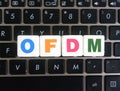 Abbreviation OFDM on keyboard background