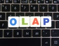 Abbreviation OLAP on keyboard background Royalty Free Stock Photo