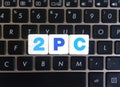 Abbreviation 2PC on keyboard background