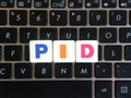 Abbreviation PID on keyboard background Royalty Free Stock Photo