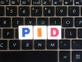 Abbreviation PID on keyboard background