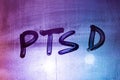 abbreviation ptsd - post traumatic stress disorder - handwritten on night wet window glass