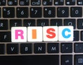 Abbreviation RISC on keyboard background