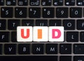 Abbreviation UID on keyboard background