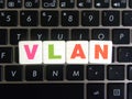 Abbreviation VLAN on keyboard background Royalty Free Stock Photo
