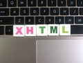 Abbreviation XHTML on keyboard background Royalty Free Stock Photo