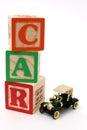 ABC Blocks and Black Antique Car Royalty Free Stock Photo
