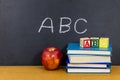 Abc children wood blocks books apple blackboard knowledge Royalty Free Stock Photo