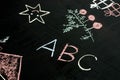 Abc letters chalk drawing on blackboard selective focus macro Royalty Free Stock Photo