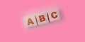 ABC letters on natural wooden blocks. Elementary school education concept Royalty Free Stock Photo