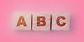 ABC letters on natural wooden blocks. Elementary school education concept Royalty Free Stock Photo