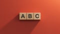 ABC letters wooden blocks on red background. Education concept. Royalty Free Stock Photo