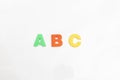 ABC plastic magnetic alphabet on a white background