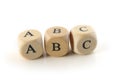 Abc, spelled with wooden blocks, isolated, white background Royalty Free Stock Photo