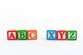 ABC and XYZ alphabets wooden blocks. Selective focused with copy space Royalty Free Stock Photo