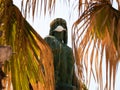 Abderraman statue in AlmuÃÂ±ecar, Granada, wearing a coronavirus face mask Royalty Free Stock Photo