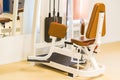 Abductor machine for legs spreding in modern gym Royalty Free Stock Photo