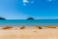 ABEL TASMAN, NEW ZEALAND, FEBRUARY 6, 2020: Yellow kayaks at Onetahuti beach at Abel Tasman national park in New Zealand