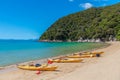 ABEL TASMAN, NEW ZEALAND, FEBRUARY 6, 2020: Yellow kayaks at Onetahuti beach at Abel Tasman national park in New Zealand