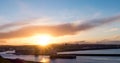 Aberdeen City harbor with supply vessel entering during sunset