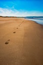 Aberdovey Aberdyfi Wales Snowdonia UK vast beautiful seascape holiday destination footprints on the sand nostalgic concept Royalty Free Stock Photo