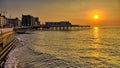 Aberystwyth Seafront on the coast to the Irish Sea with promenade and pier at sunset.