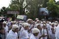 Children dressed as Gandhi rallying on street