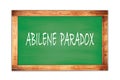 ABILENE PARADOX text written on green school board