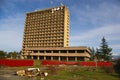 Abkhazia, war-ravaged spa-hotel and rusty car