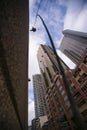 Blurry rope access worker abseiler wearing safety helmet fall protection placing safety ropes protection abseiling down from hig