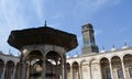 Ablution fountain and the clock tower in courtyard of The great mosque of Muhammad Ali Pasha or Alabaster mosque at the Citadel of Royalty Free Stock Photo