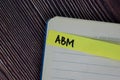 ABM write on sticky notes isolated on office desk